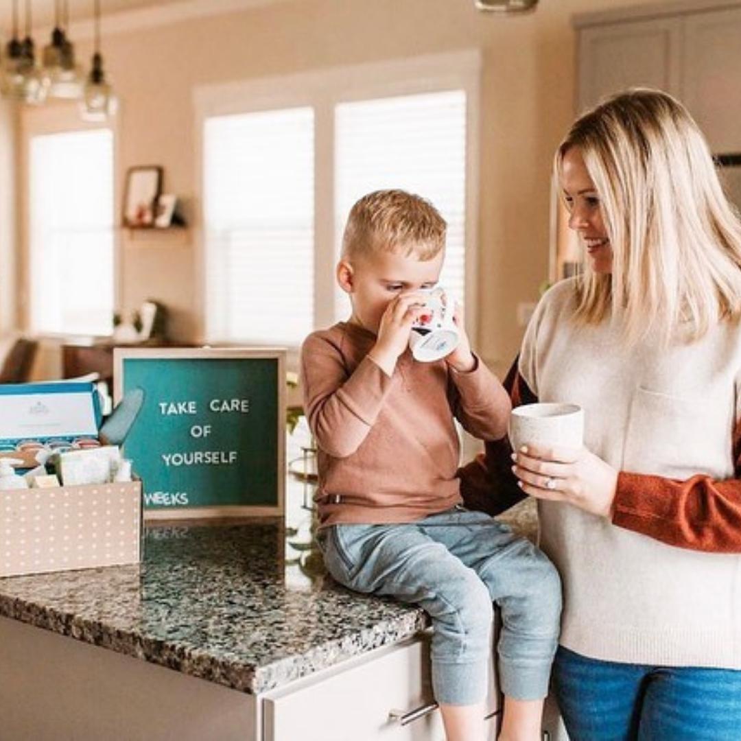Boy sipping Earth Mama Elderberry Immune Tea